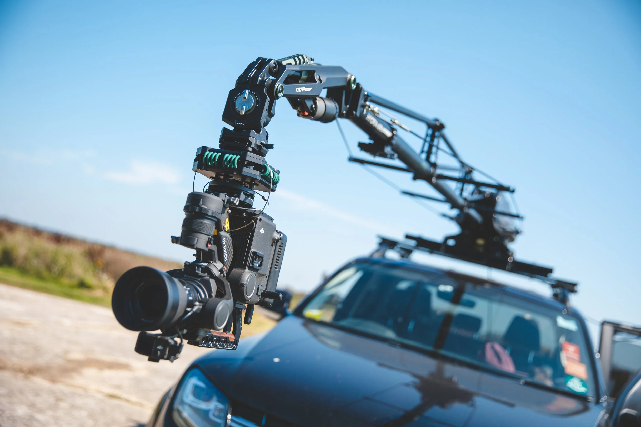 Camera rig on blue Porsche